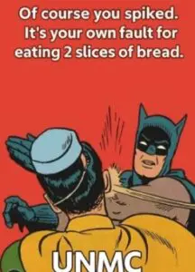 Batman slapping a man with text about bread eating.