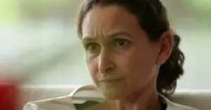 A woman with a concerned expression.